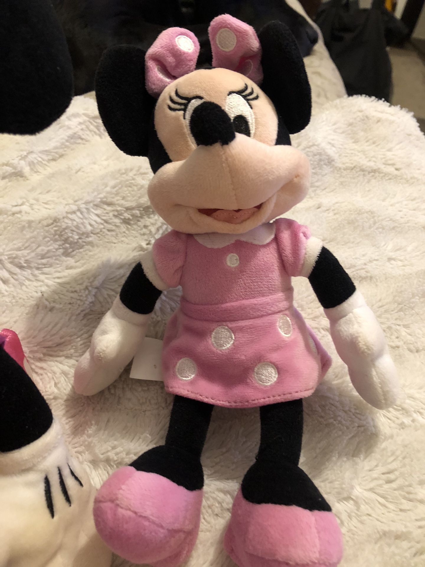A Little Girl’s Minnie Mouse Bicycle Helmet And 2 Matching Mini Mouse Disney Stuffed Toys