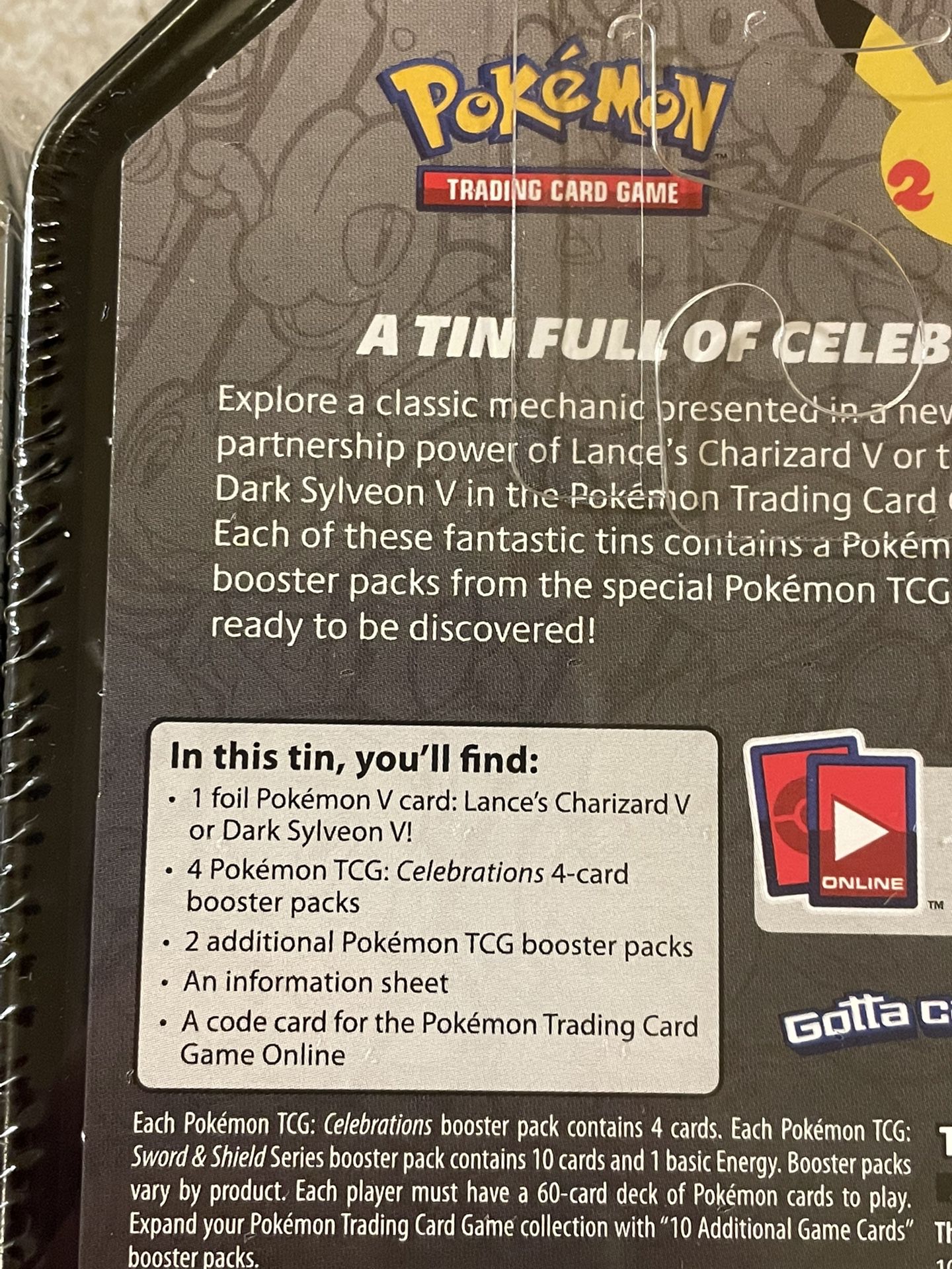 Pokémon 25th Anniversary Celebrations Collector’s Tins - Lance’s Charizard V & Dark Sylveon V