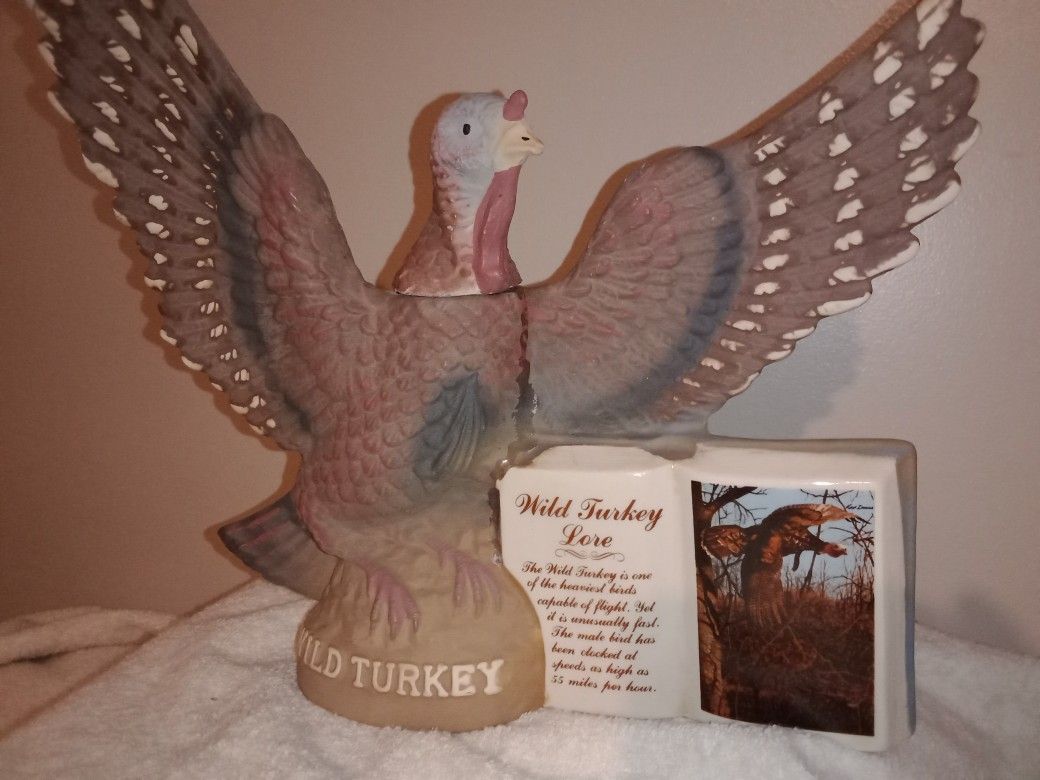 Two Empty Vintage Wild Turkey Bottles.