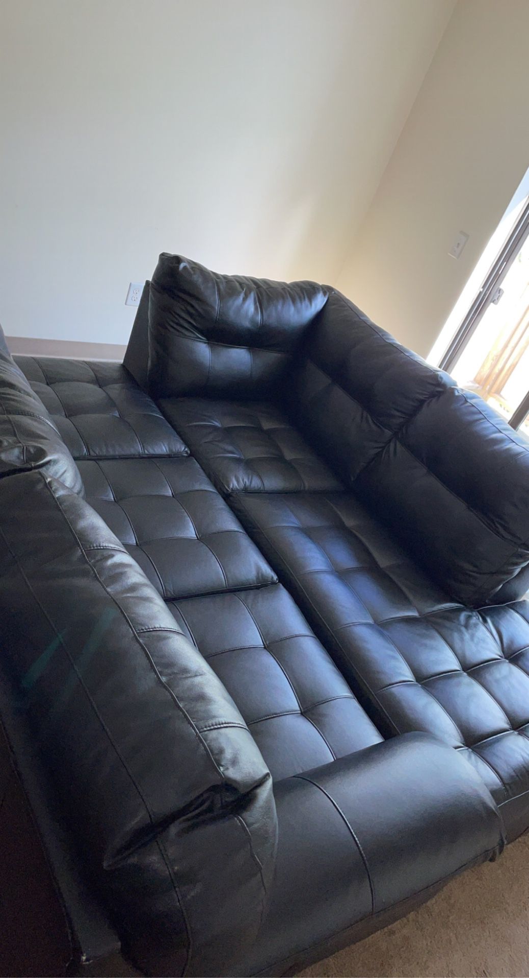 Black leather Sectional sofa