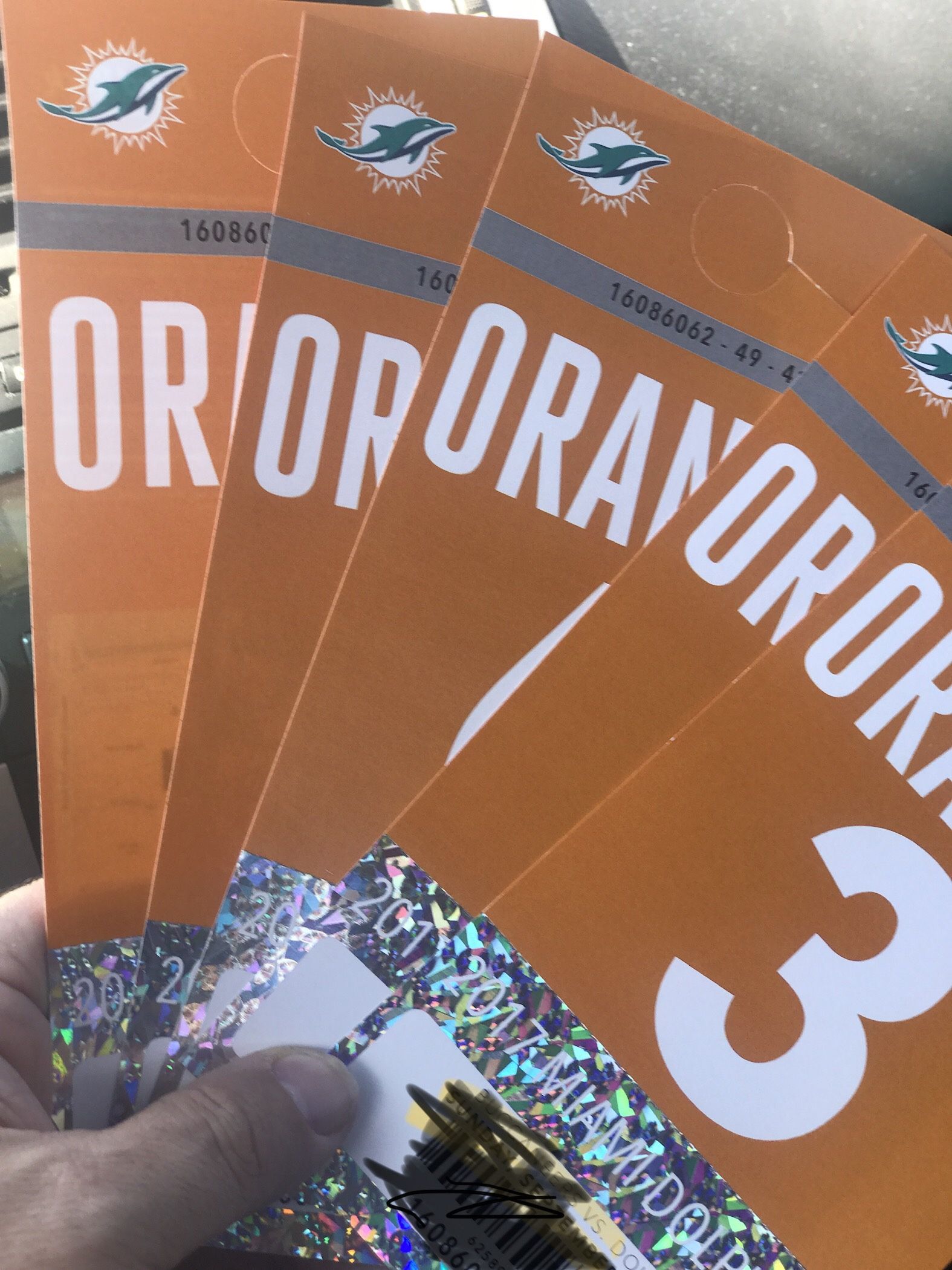 Dolphins Orange Parking Passes
