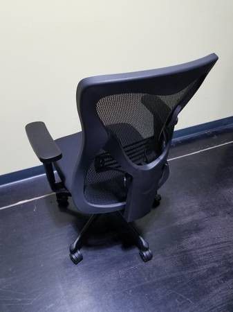 Brand new! Mid Back Task chair with mesh back and adjustments galore!

