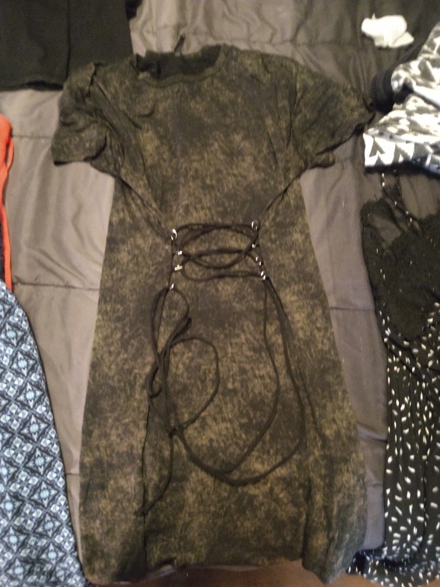 Only a few of many in a big people tub. Some large, medium, size 12-16 pants, jackets, and hooded shirts, night gowns,dresses