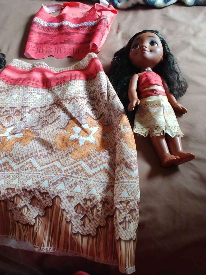 2two Moana dolls. And A Outfits 