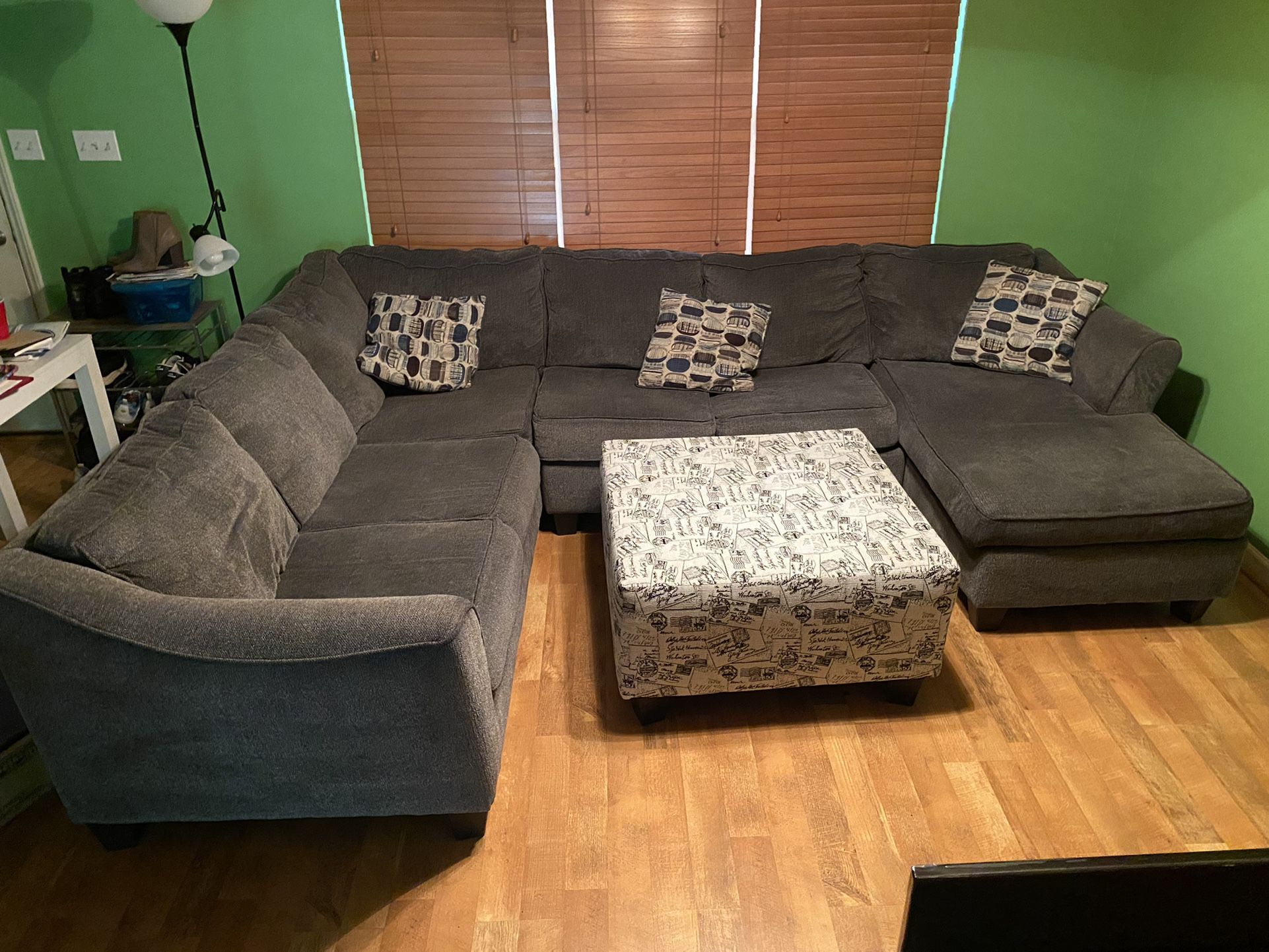 Large Grey Sectional With Stylish Ottoman