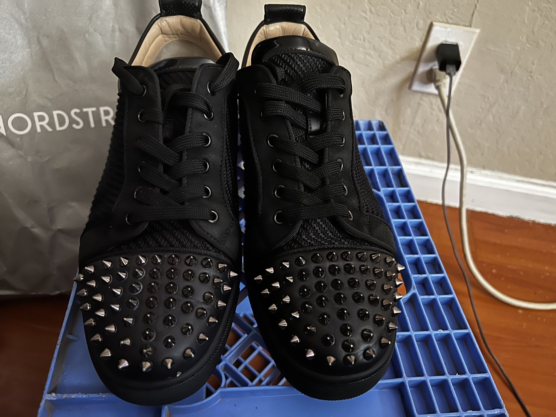 Low top Christian Louboutin/Red bottoms