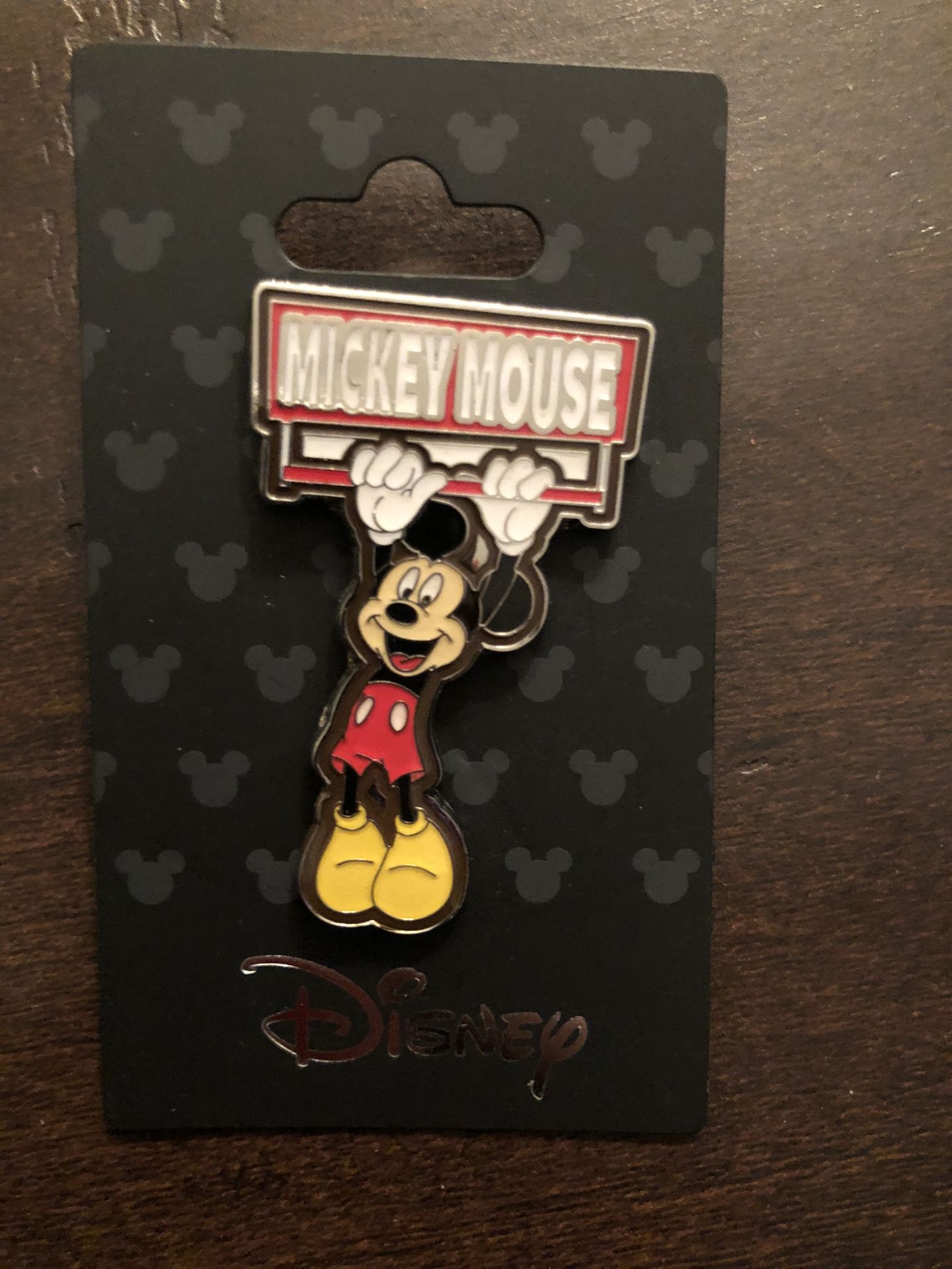 Disney, Mickey Mouse Hanging from Name Swinging Monogram International Disney Pin