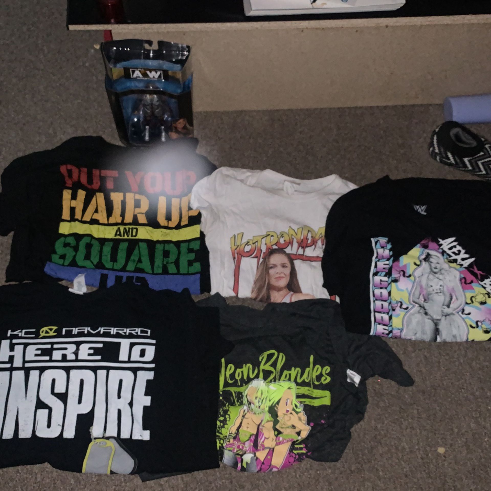wrestling shirts and aew figure
