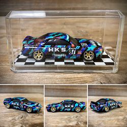 CUSTOM 1:64 HKS Nissan Skyline R32 - Hot Wheels (Lowered + camber with upgraded 7-spoke gold wheels with chrome lip) Thumbnail