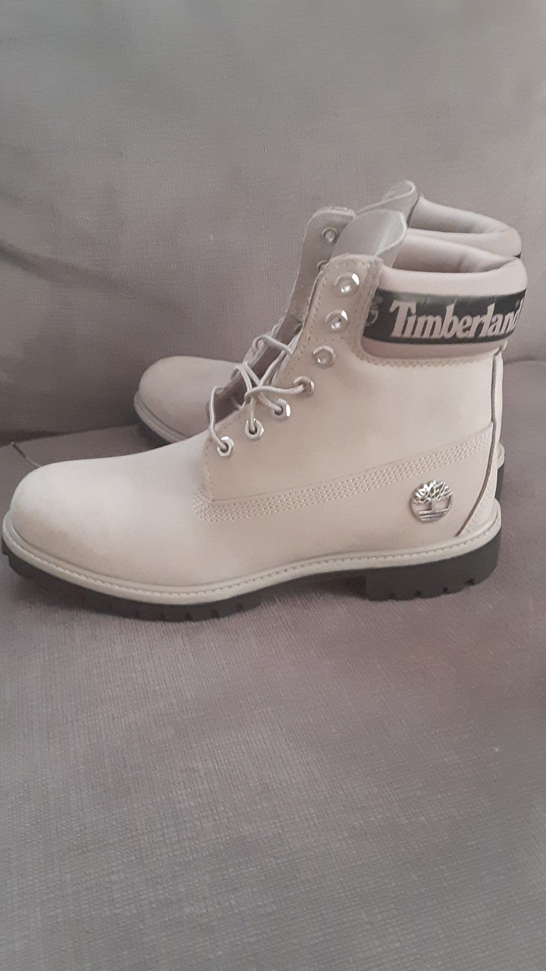 Size 9. Gray Timberland Boots Waterproof worn only 4 times. Need $100