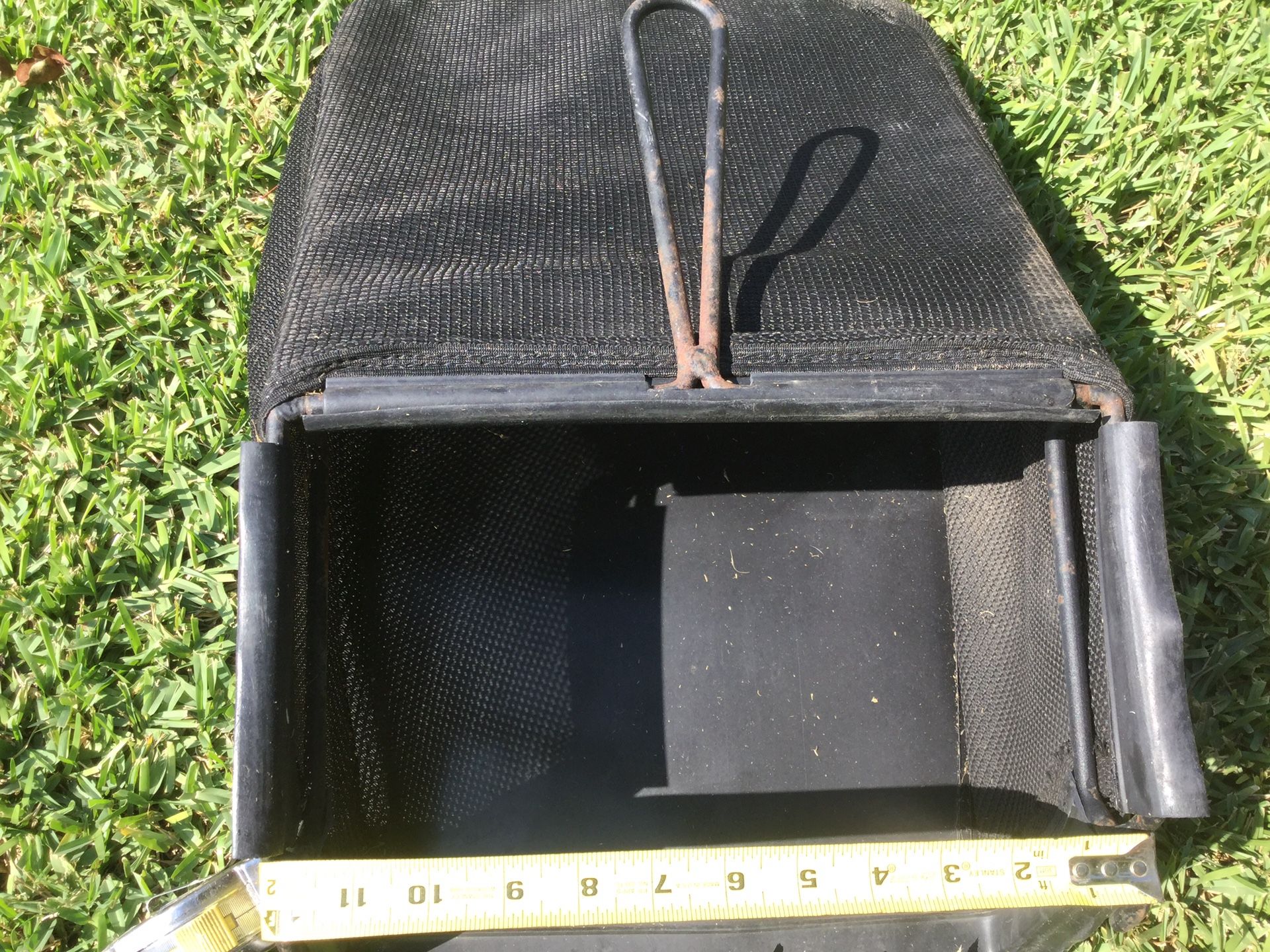 Lawn mower bag, hooks are 12 in. Apart
