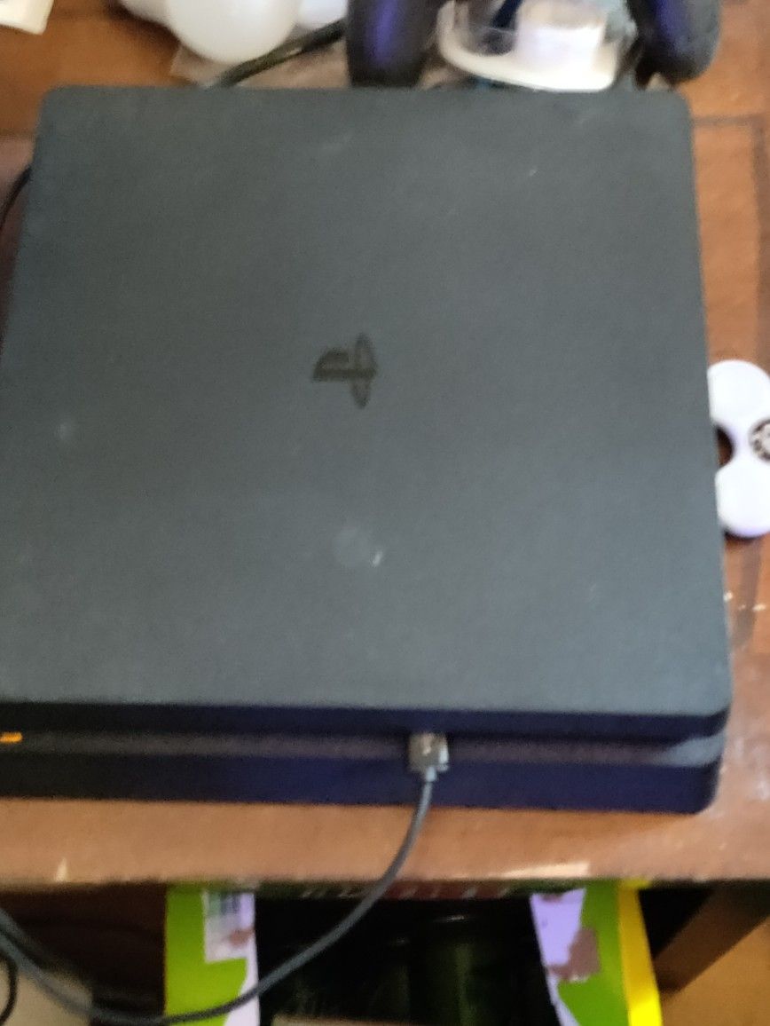 PlayStation 4 Slim With Games And Accessories