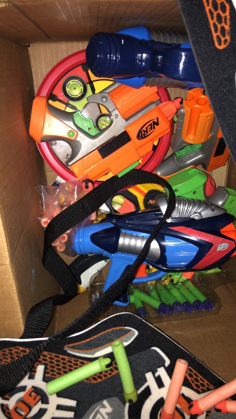 Box Of Nerf Guns Extra Darts And Target Vests