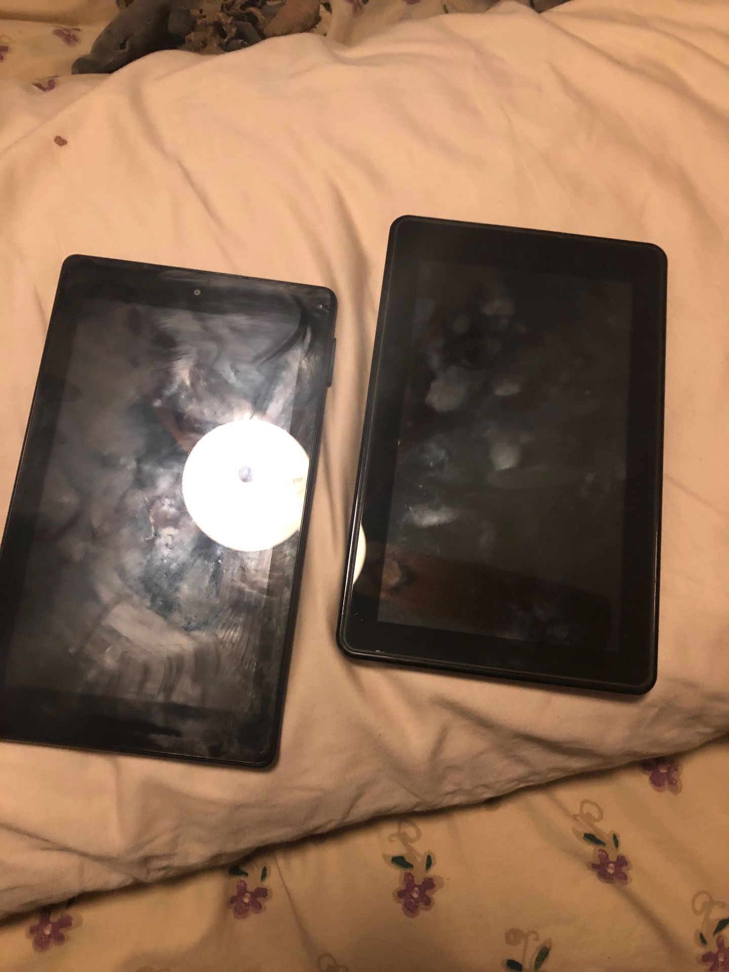 Two tablets ones a kindle fire others just an Amazon tablet