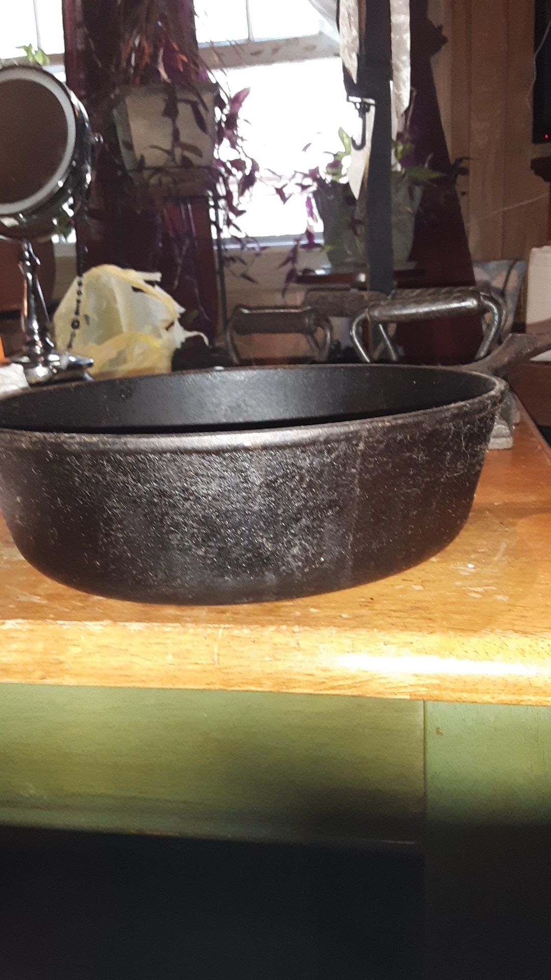 One deep dish cast iron frying pan Wagner's