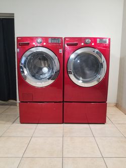 LG RED WASHER AND GAS DRYER FREE DELIVERY AND INSTALLATION ALSO A 90 DAY WARRANTY  Thumbnail