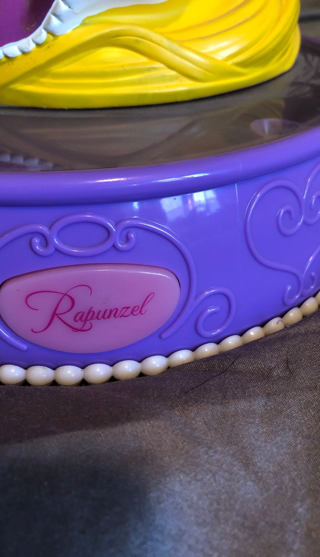 Rapunzel singing piggy bank