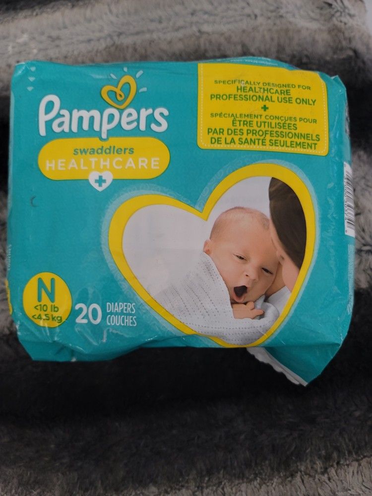 PAMPERS newborn 20 Diapers Coches < 4.5 Lbs/ <10 Lb
