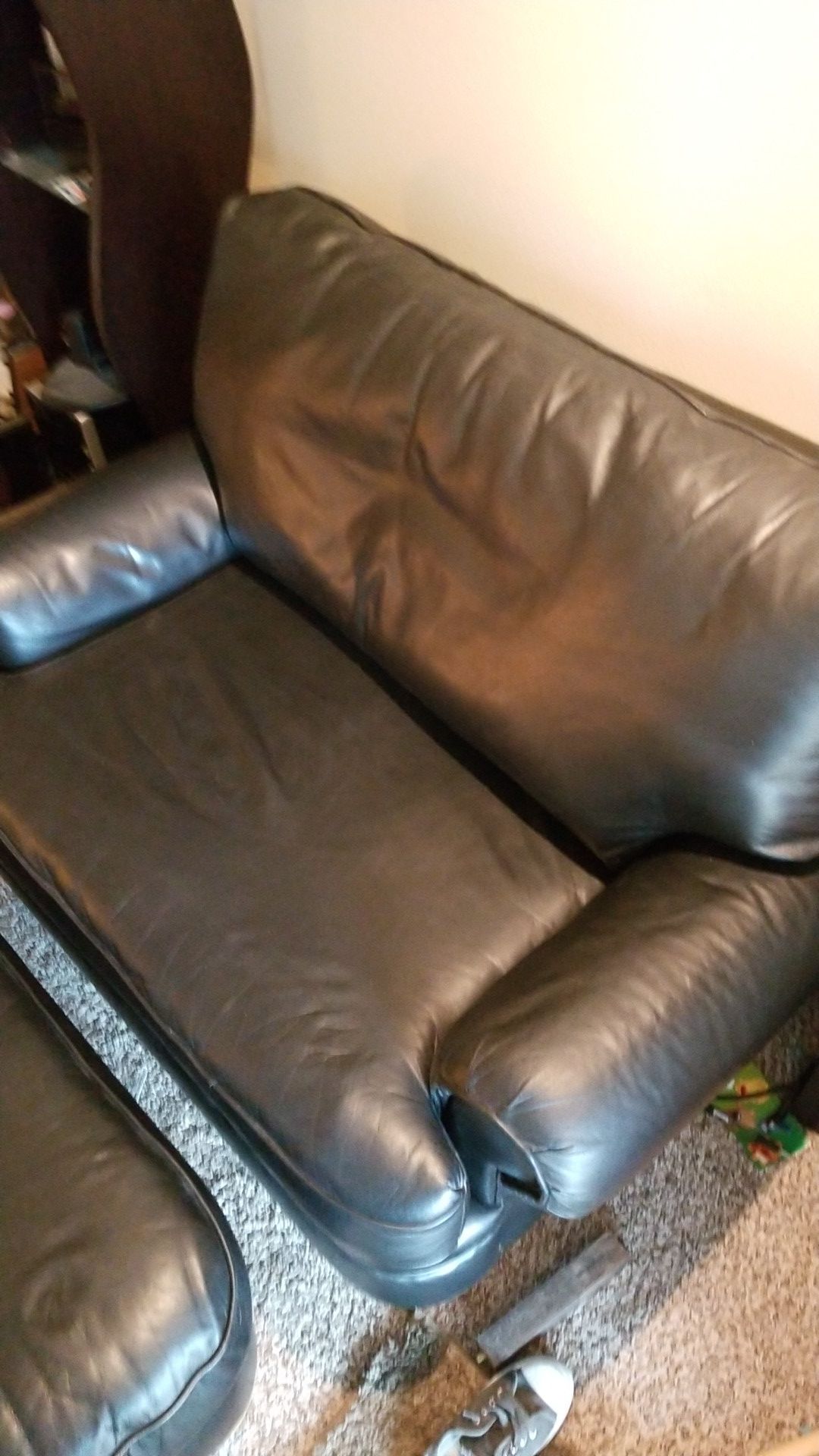 Genuin black Leather oversized chair/love seat and ottoman
