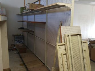 Metal Shelving With Pegboard And A Few Shelves Thumbnail