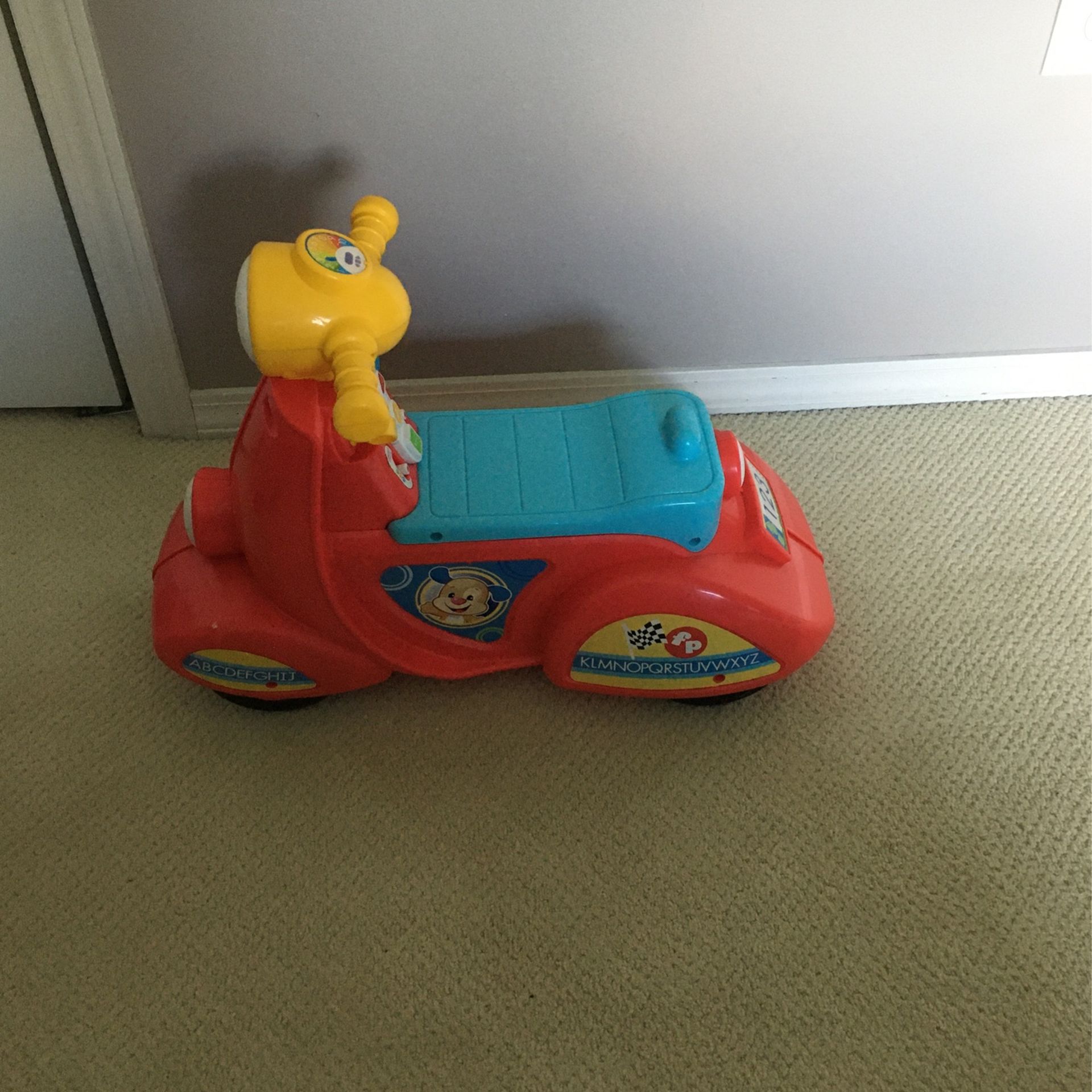 Fisher-Price Laugh & Learn Smart Stages Scooter