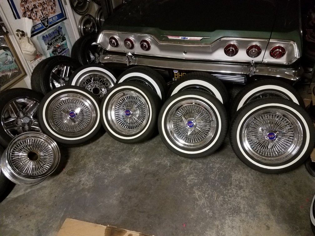 15x7 wire 100 spoke lowrider white wall tires 3 wing knockoffs Daytons chips or trade 13x7