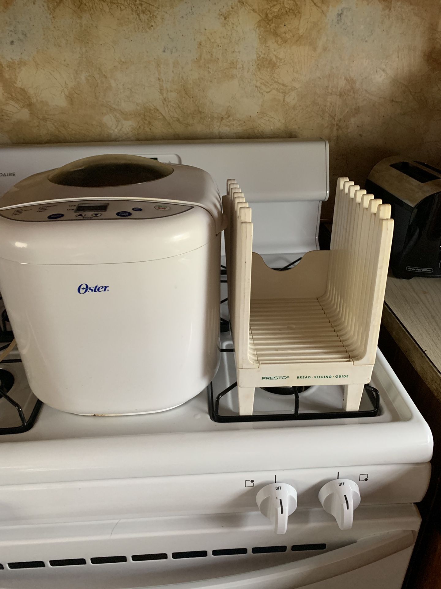 Oster bread maker and Presto bread slicer guide
