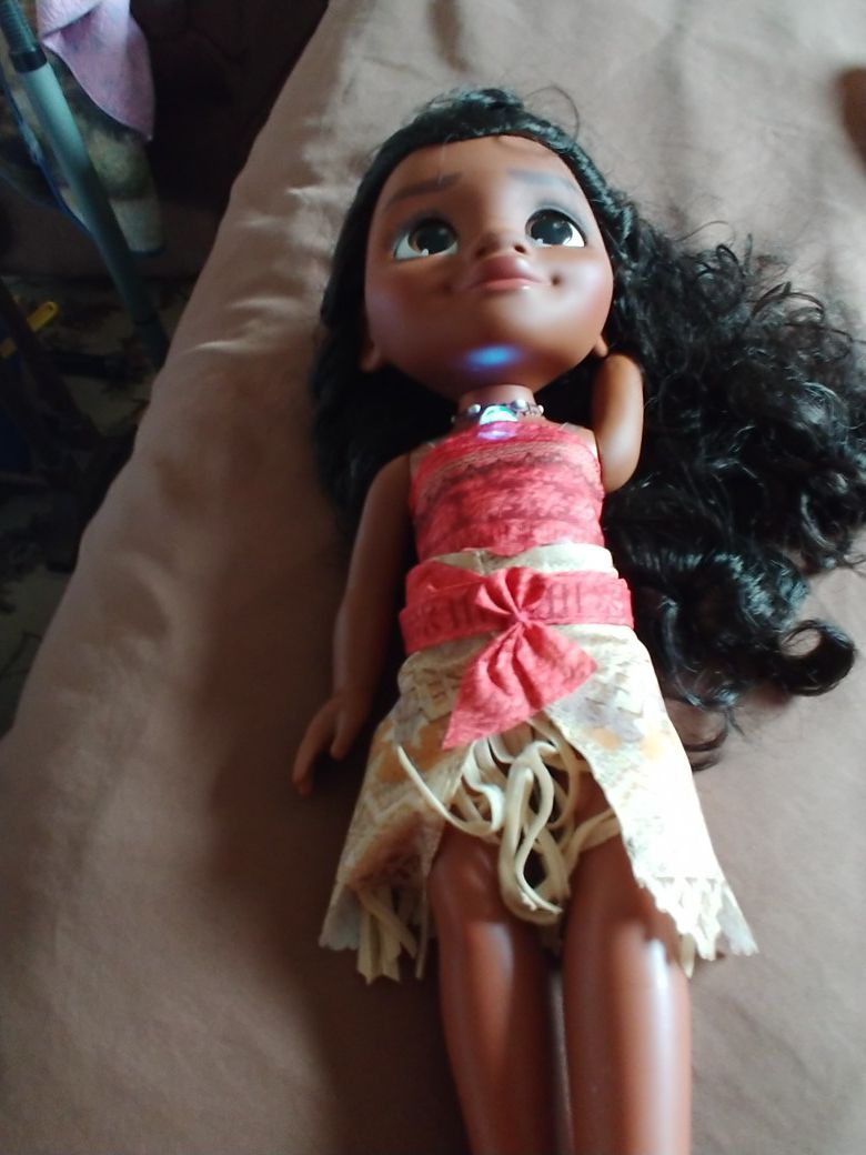 2two Moana dolls. And A Outfits 