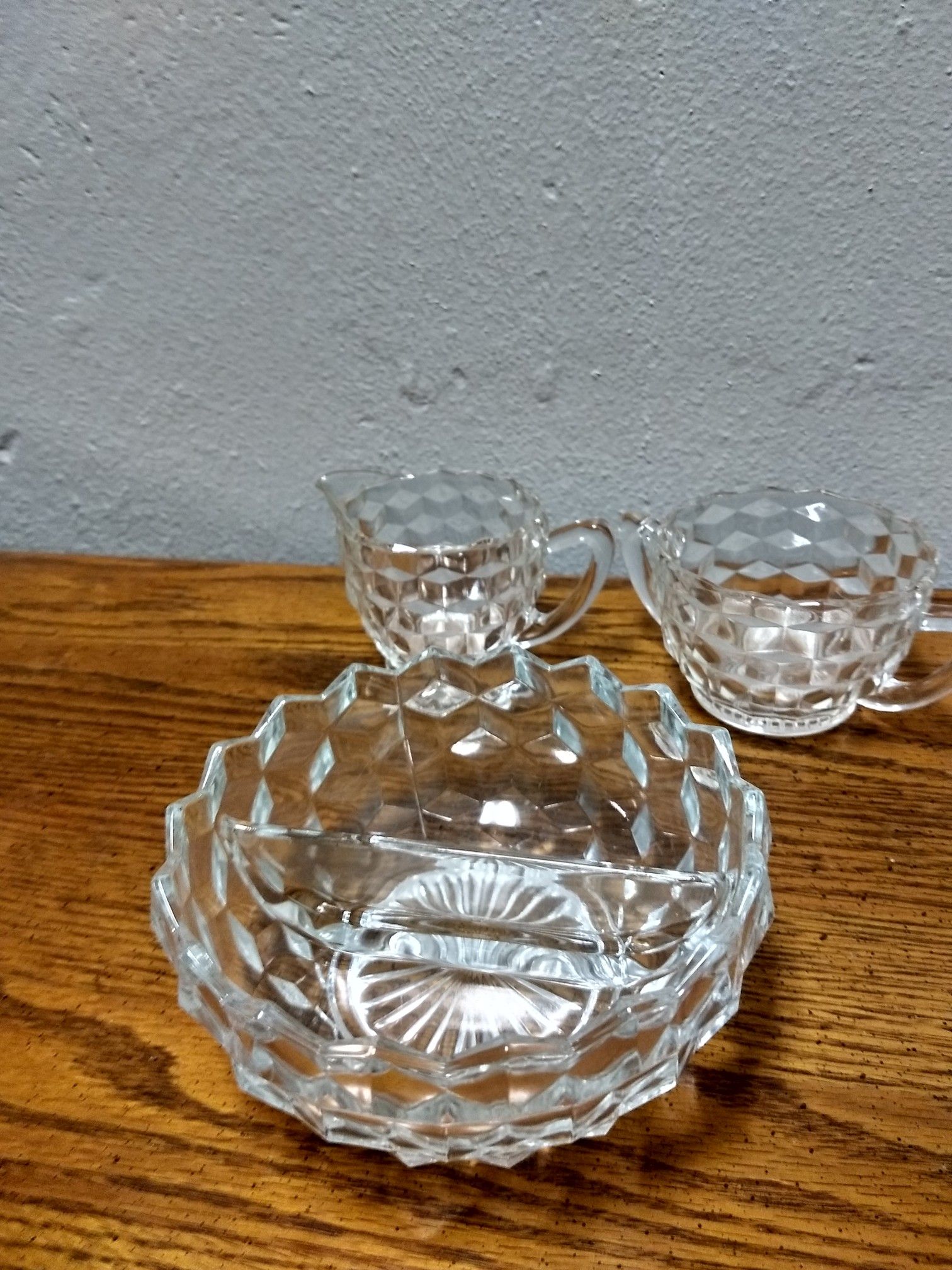 Depression glass, sugar - creamer and small divided bowl.