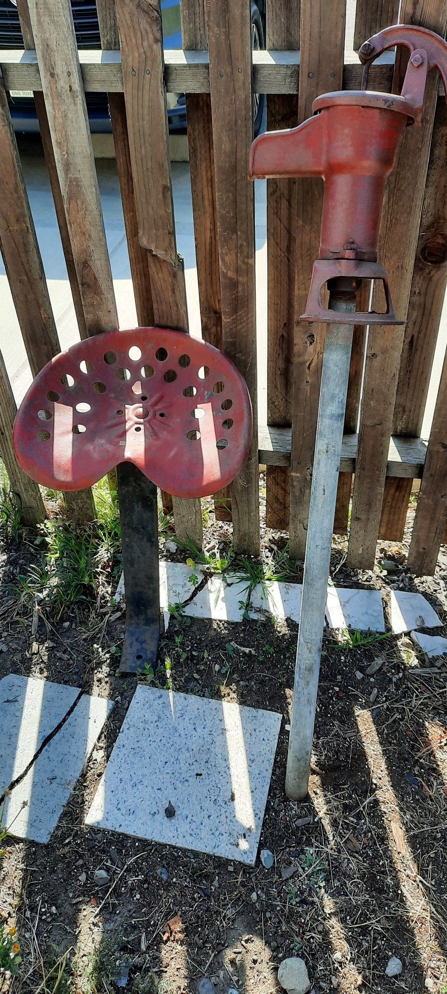 Water Pump and Tractor Seat for Garden Display Or Actual Use
