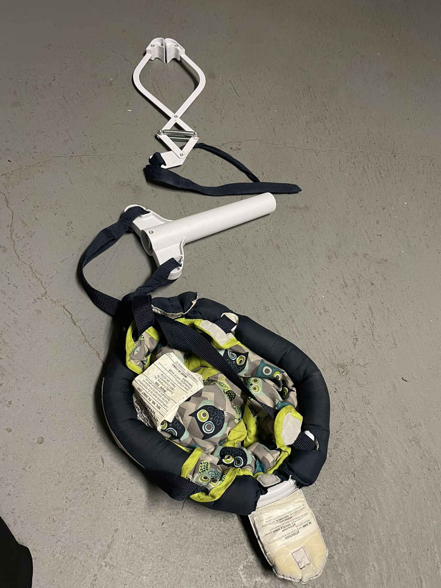 A Baby Indoor Swing , and a Baby Holder 