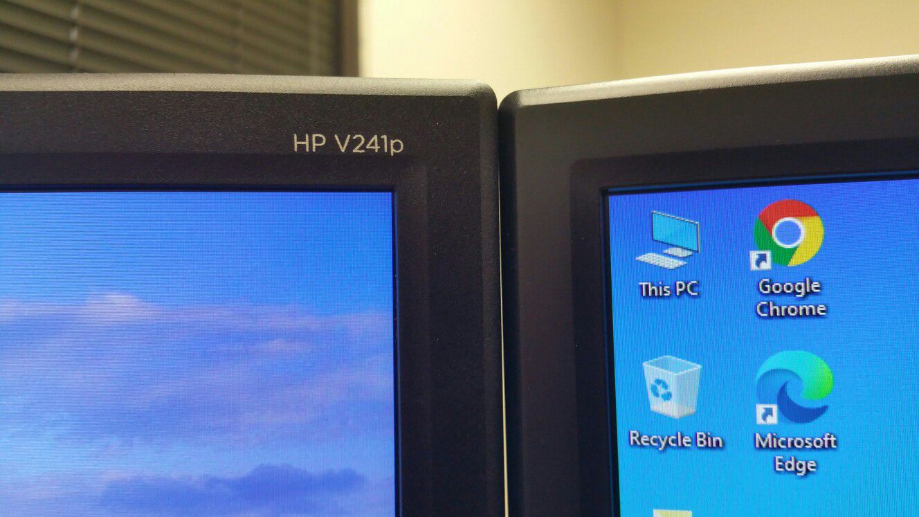 Dual-armed HP 24" LED monitors with cables: VGA, or DVI or HDMI or DP cables with power cords