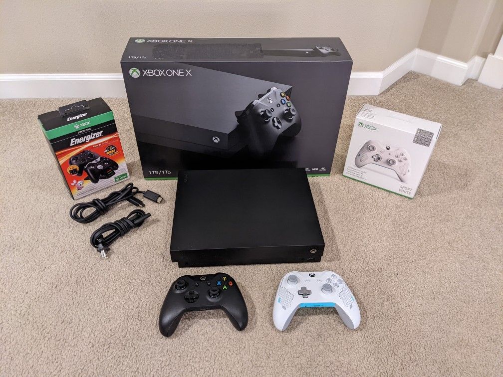 Xbox One X with extra controller and charging system