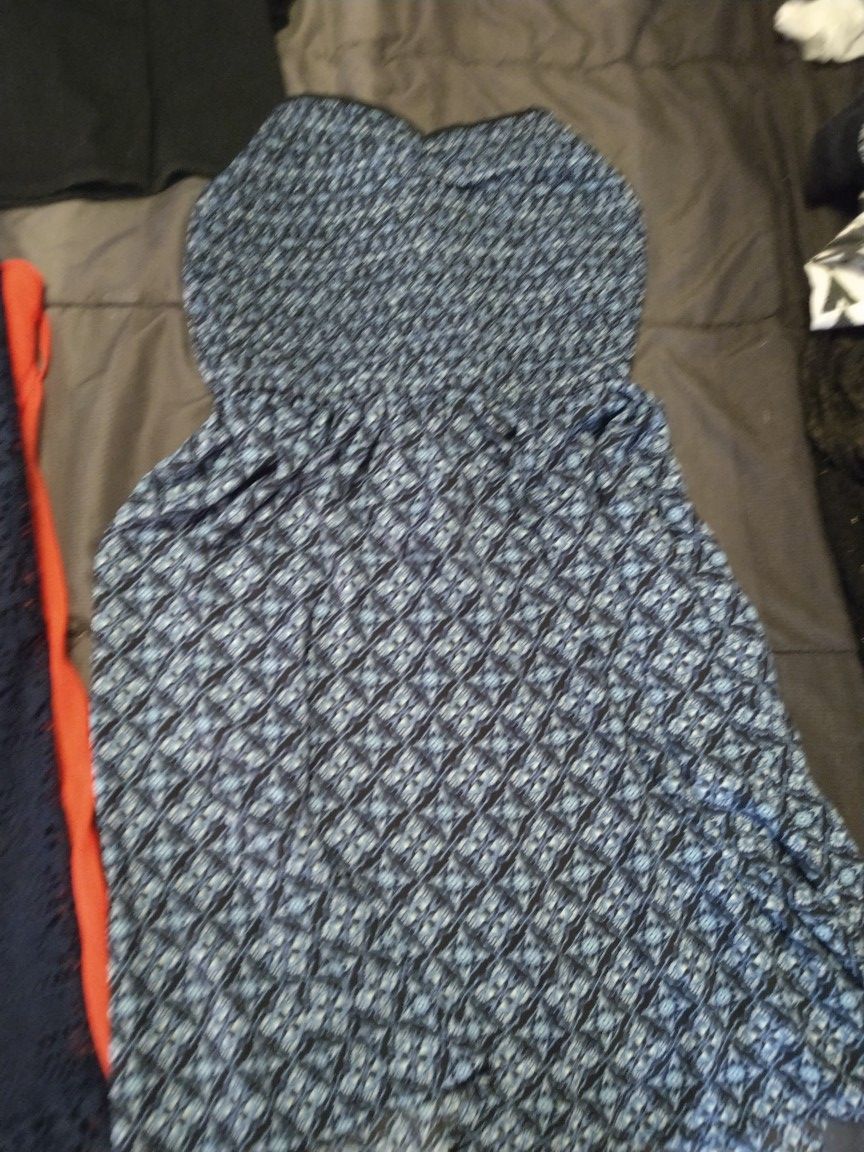 Only a few of many in a big people tub. Some large, medium, size 12-16 pants, jackets, and hooded shirts, night gowns,dresses