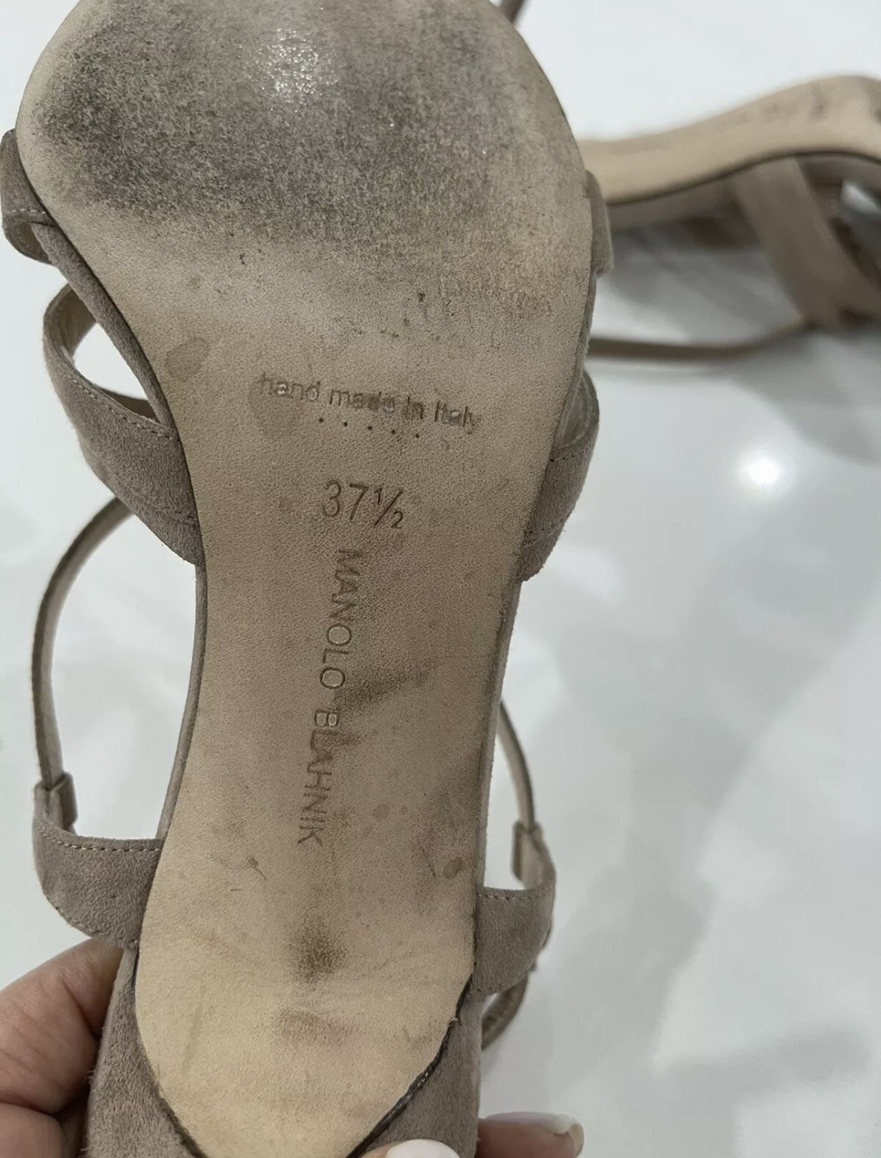 Manolo Blahnik 37.5 pre owned. Round toe. Lace up closure. Ankle strap with adjustable buckle. Leather lining and sole. With a 70mm (2 3/4”) heel. Ma