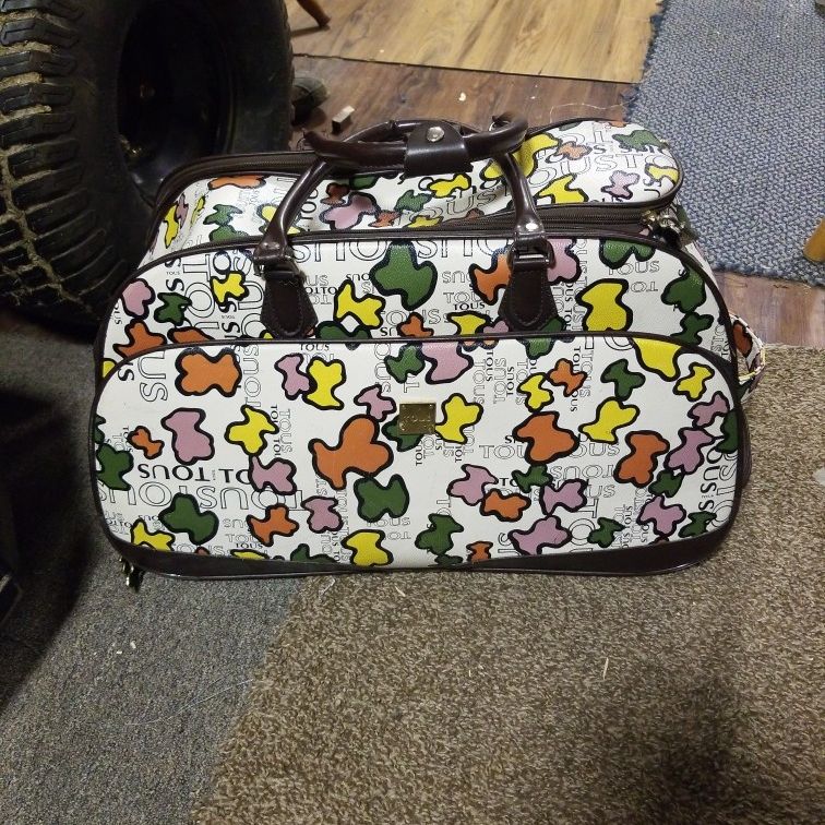 Tous Carryon Rolling Duffle Bag