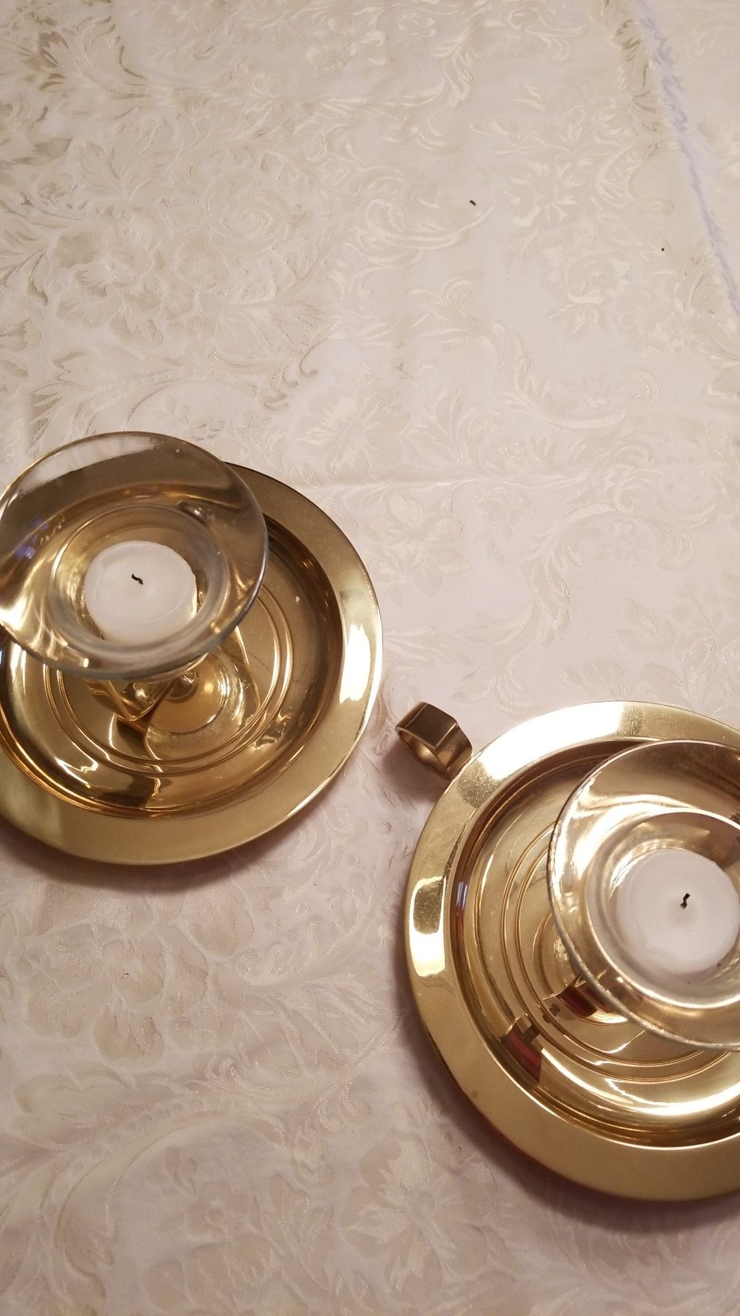 Brass candle holders, either free standing or can be hung on wall