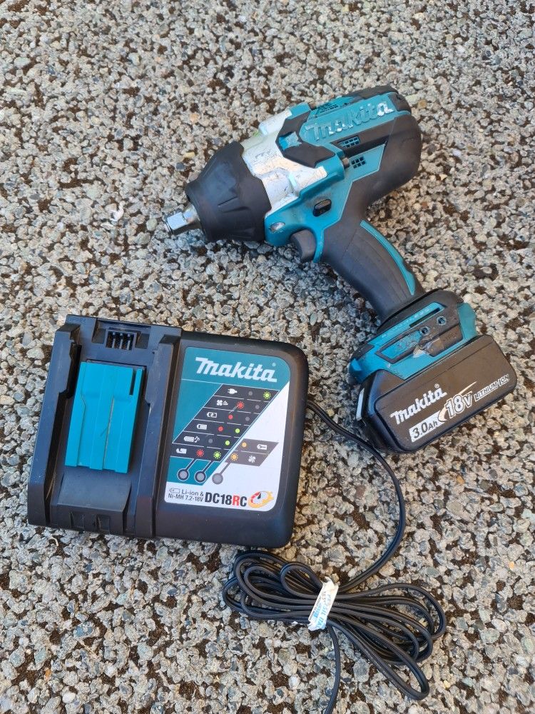 Makita 18-Volt LXT Lithium-Ion Brushless Cordless High Torque 1/2 in. Square Drive Impact Wrench w/ (1) Battery And Charger.