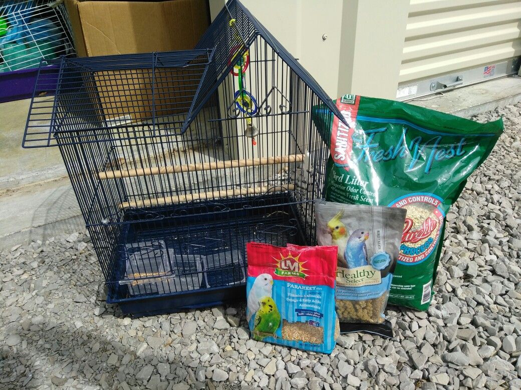 Bird cage and stuff to go with it