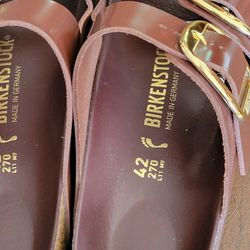 Birkenstock Sandals Arizona 240 L11 M9 Size 42 High shine chocolate 
leather.  Gold tone hardware. New, never been worn Thumbnail