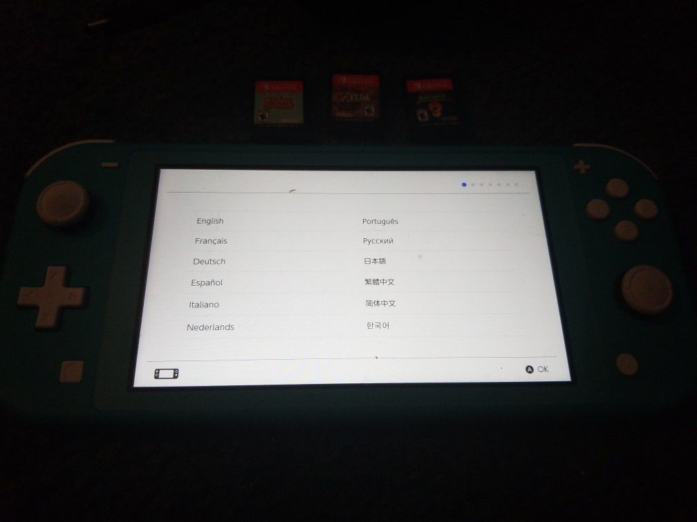 Switch LITE, Barely Used. + 3 Games
