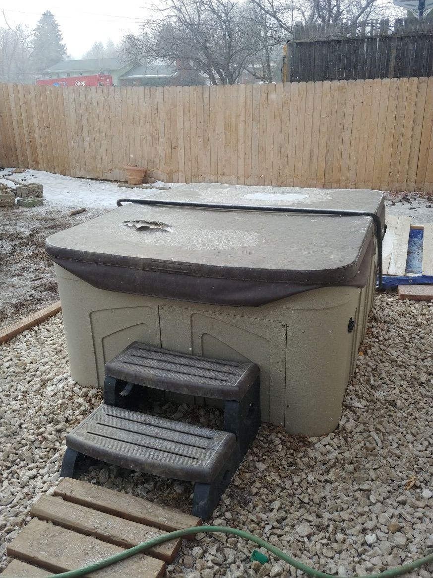 Four person hot tub