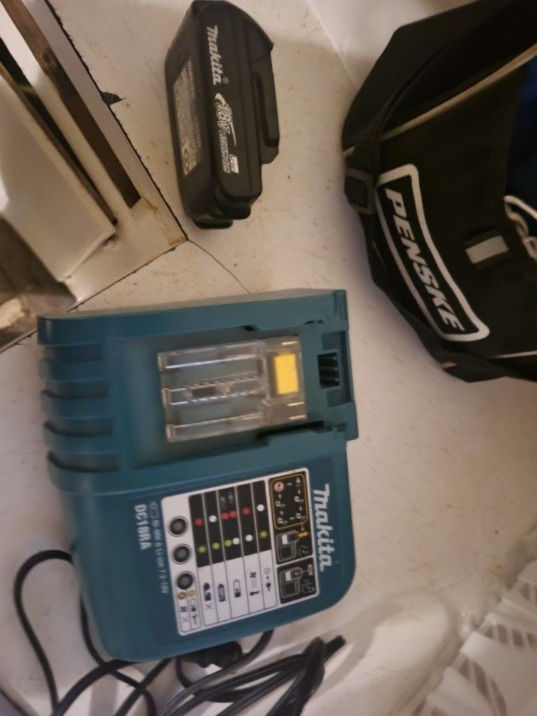 Makita Charger And 20 V Lithium Battery