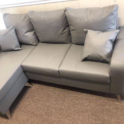 NICE!! SMALL GREY LEATHER SECTIONAL!! (PERFECT FOR KIDS ROOM OR OFFICE!!) Thumbnail