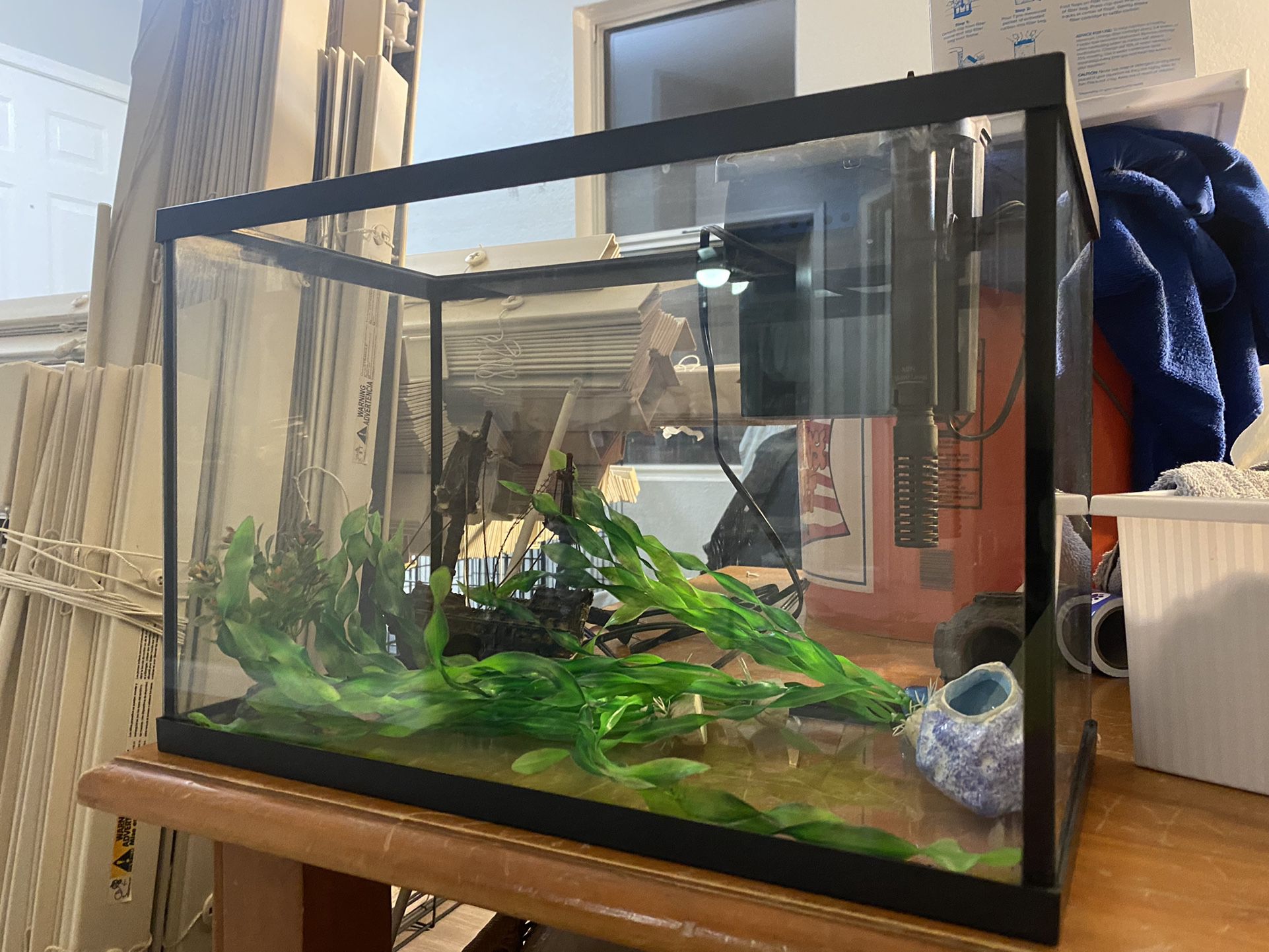 5 Gallon Fish tank with starter items.