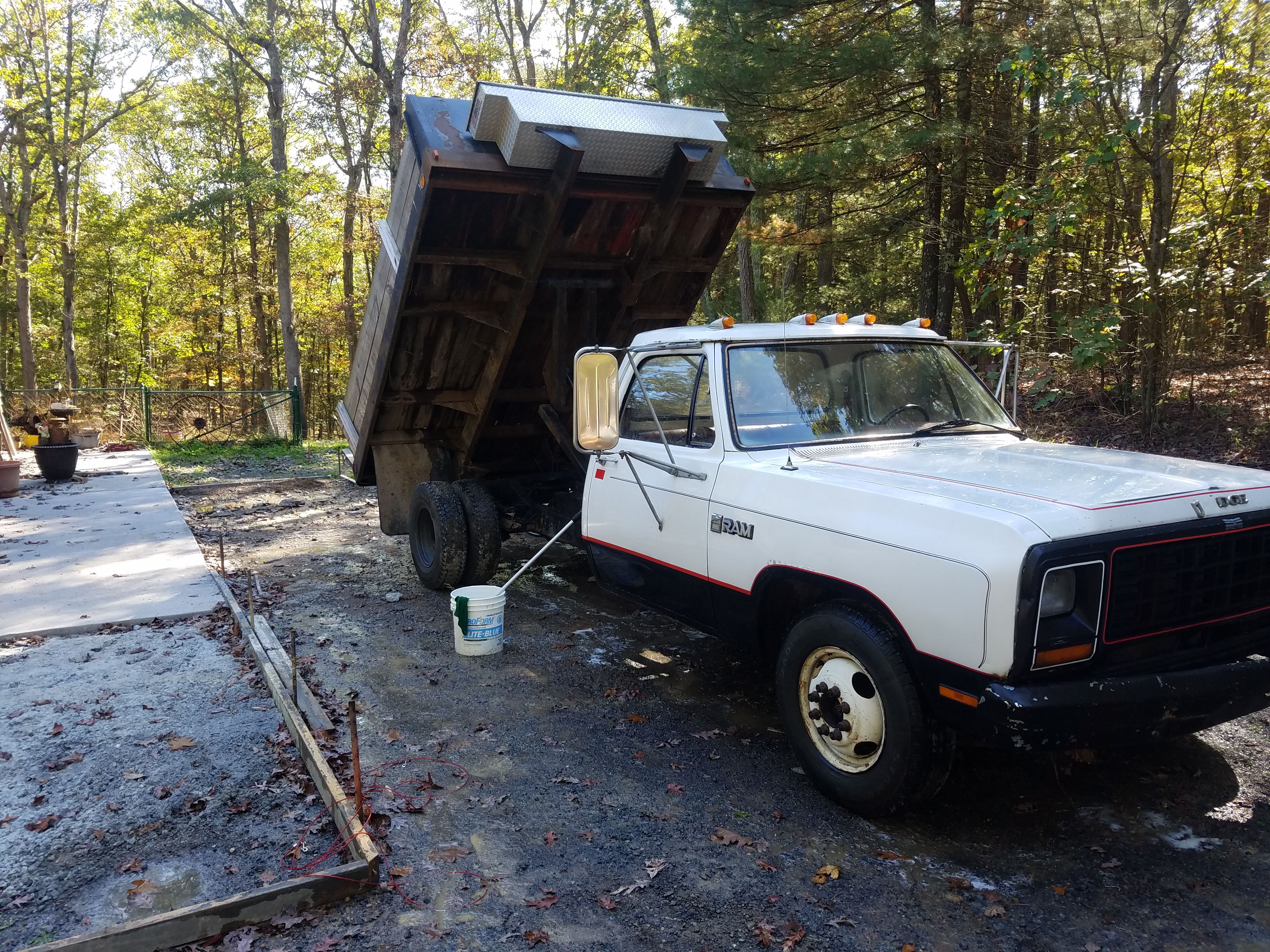 1984 dodge dump and 2012 trailer