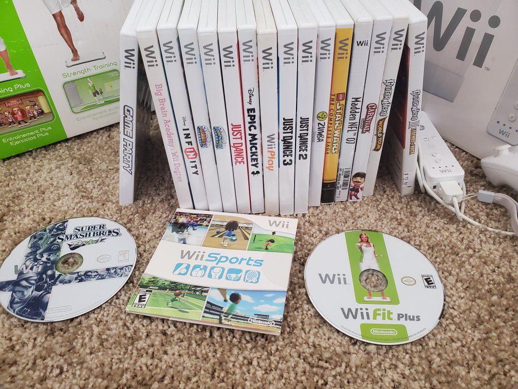 Wii with games and guitar