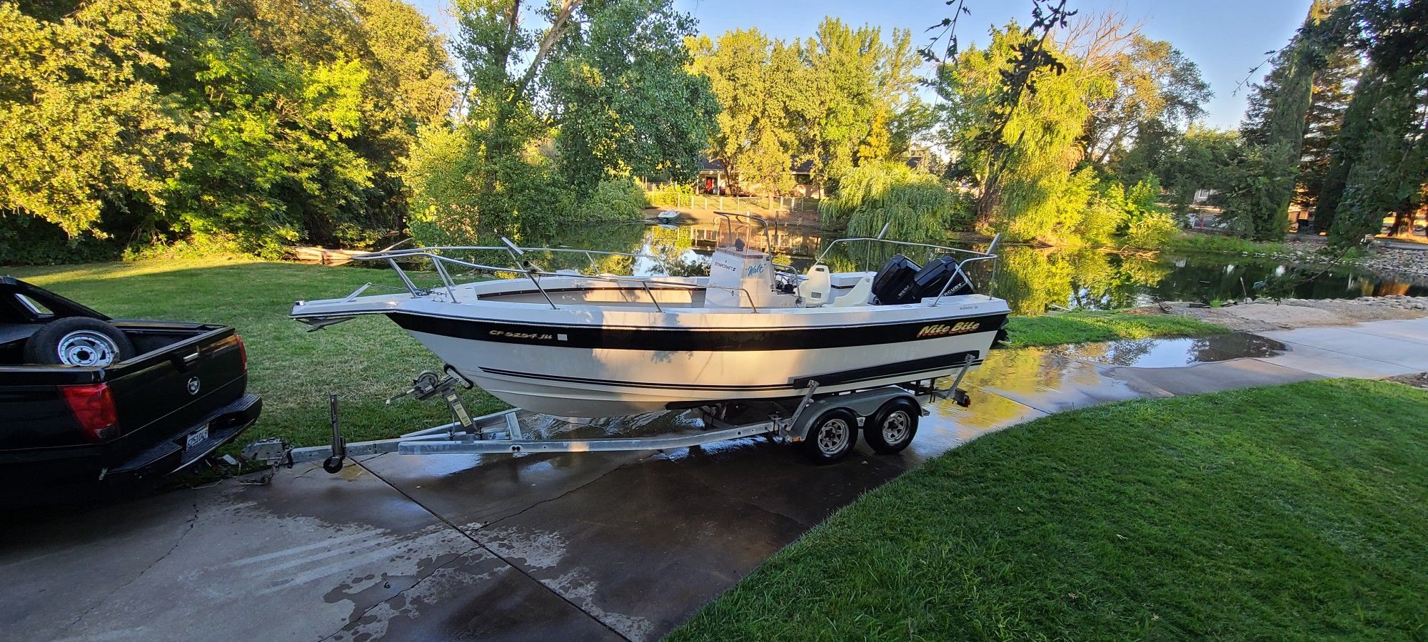 BLUEWATER 210 CENTER CONSOLE BOAT W/ 2 MERCURY 115 OUTBOARDS