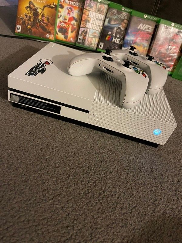 xbox one s am giving it out to bless someone who first wish me happy wedding anniversary on my cellphone number now 707^340^9916