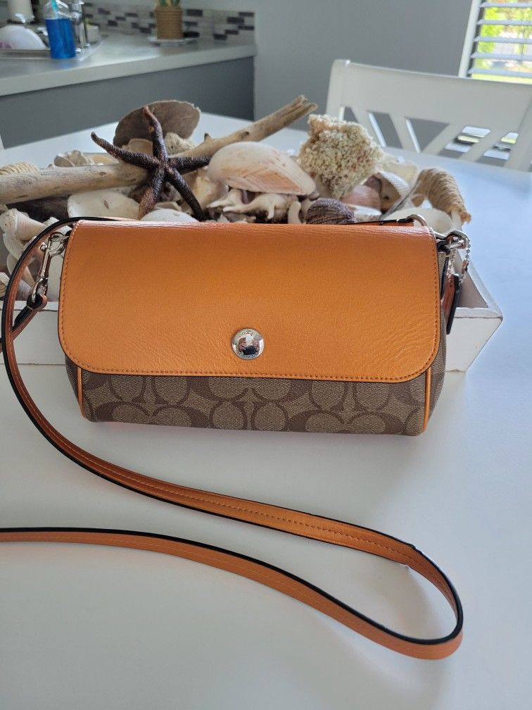 Coach Handbags, wallets And Wristlets